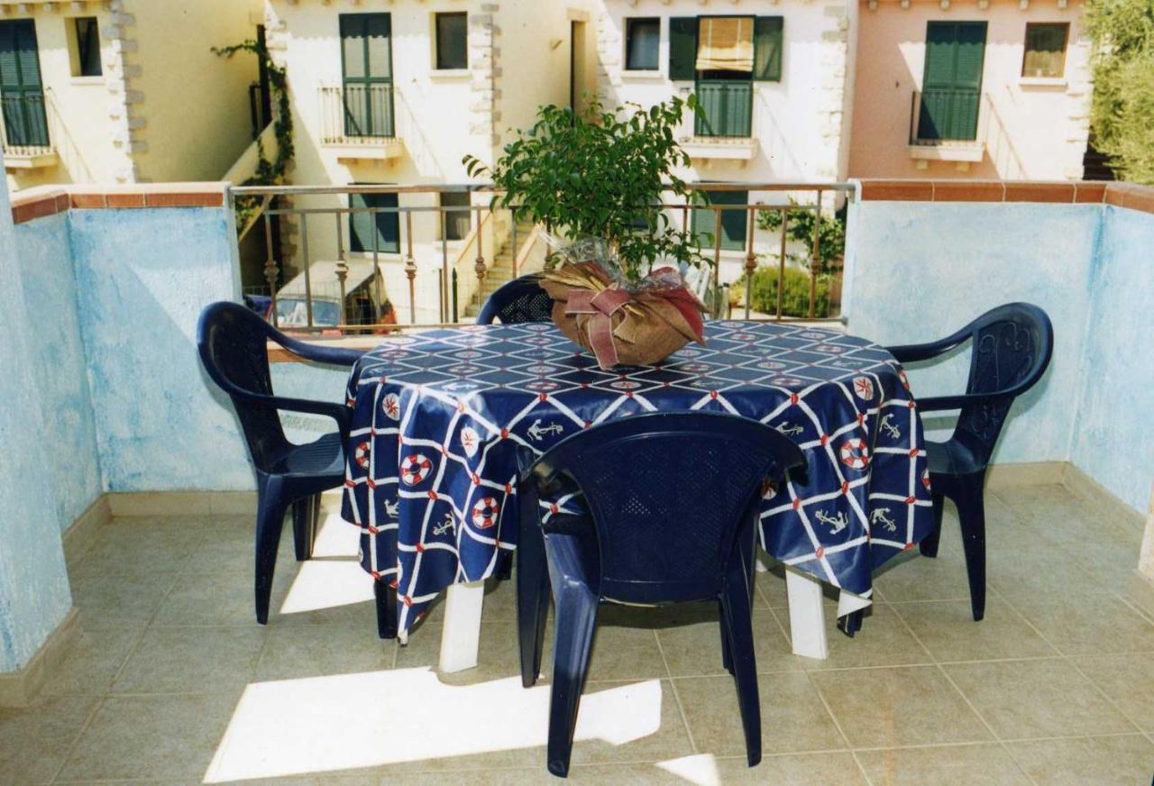 Borgo Marino Badesi Aparthotel Bagian luar foto
